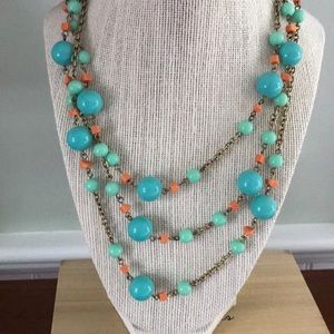 Turquoise and orange beaded necklace